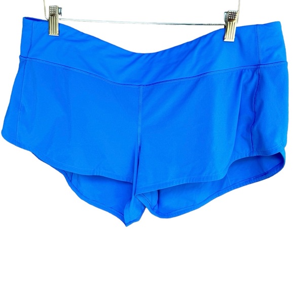 Speed Up Low-Rise Lined Short 2.5”.
Color: Poolside
Size: 14 - Picture 1 of 5